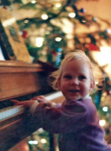 Baby Kelli playing the piano