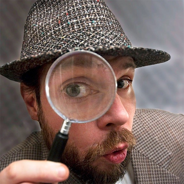 A detective with an eyeglass