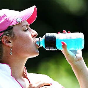 Woman drinking an energy drink