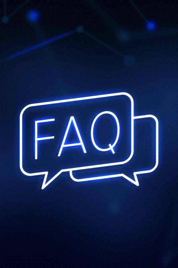 A photo of a neon sign that says FAQ.