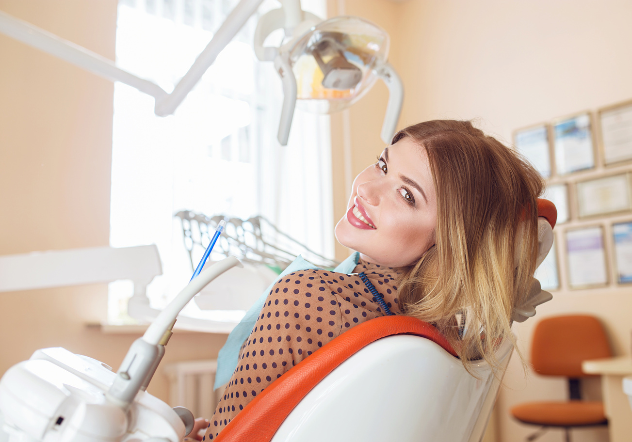 Woman smiling in the dental chair at Randall K. McVey, DMD PA in Garden City, KS Woman smiling in the dental chair at Randall K. McVey, DMD PA in Garden City, KS